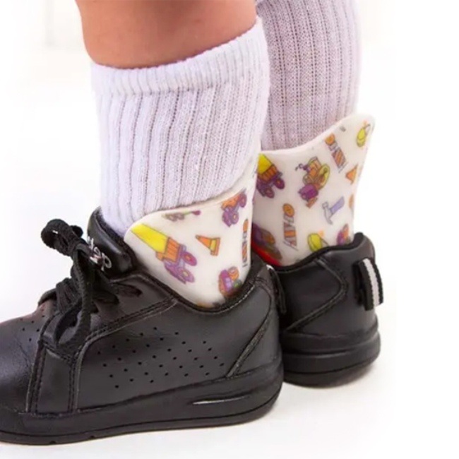 Side view of pediatric toe walking SMO braces worn by a child in New York, New Jersey, & Connecticut