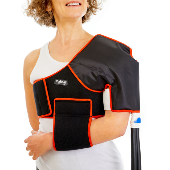 A woman is wearing the Cryo Pro™ cold compression device on her shoulder in New York and New Jersey